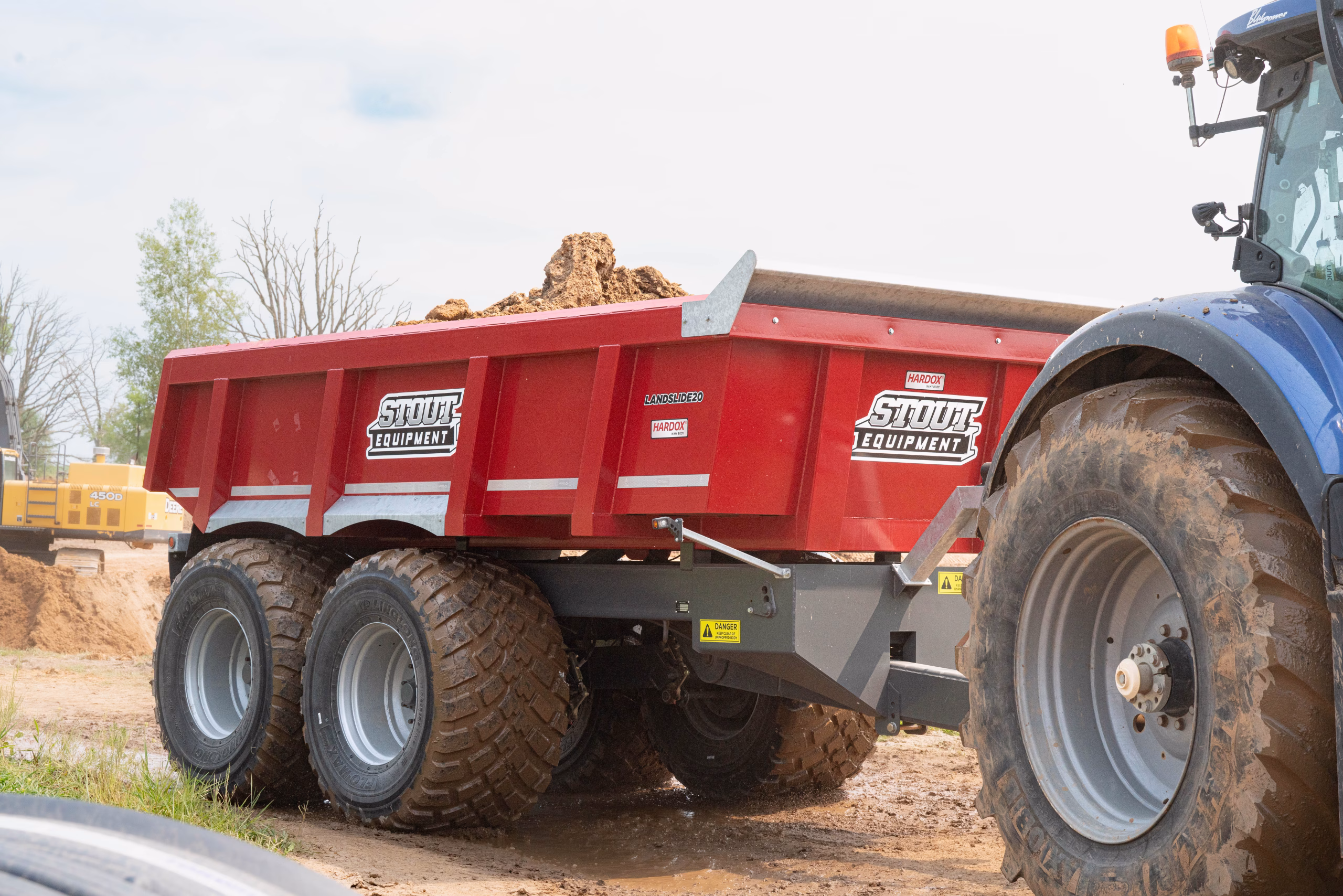 Sensineg Landslide Photo_ Dump Trailer By Stout Equipment. The Landslide